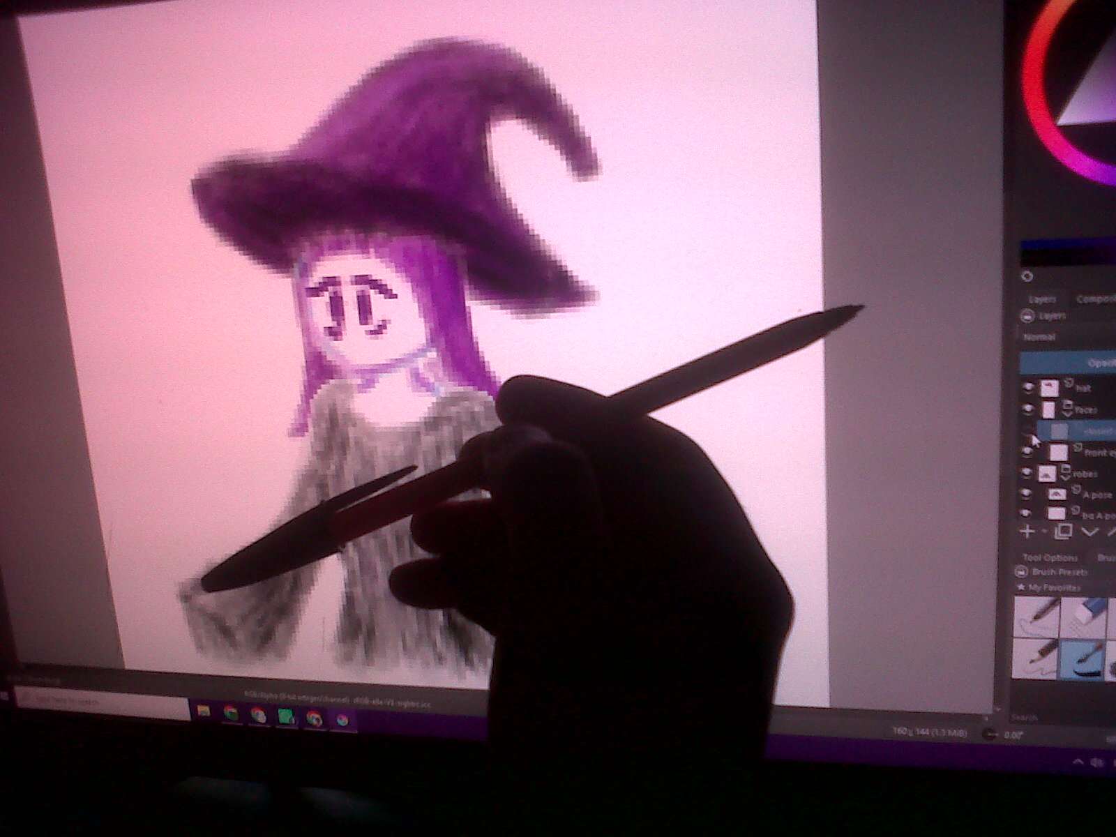 a BIC pen and a drawing on Krita